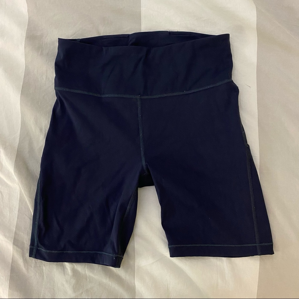 Athleta Ultimate Stash 7” Short in Powertiva